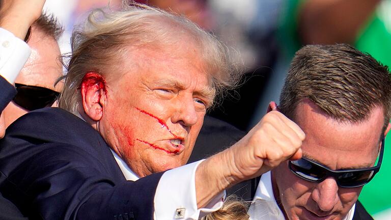 FBI: Trump-Schütze hat nach Kennedy-Mörder im Netz gesucht       -  Der frühere US-Präsident Trump wurde bei dem Attentat verletzt. (Archivbild)
