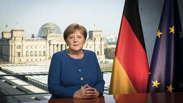 Kanzlerin Angela Merkel am Mittwochabend in ihrer Fernsehansprache zur Corona-Pandemie. Kanzlerin Angela Merkel am Mittwochabend in ihrer Fernsehansprache zur Corona-Pandemie.