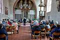 Pfarrer Peter Stier (Mitte) hielt eine Andacht und erzählte aus der Geschichte der Kirchenburg und der Stadt Marktsteft.