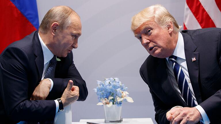 Donald Trump und Wladimir Putin beim G20-Gipfel in Hamburg - Trump ist nur ein Mal in der Bundesrepublik - und trifft zu diesem Anlass erstmals Putin. (Archivbild) Donald Trump und Wladimir Putin beim G20-Gipfel in Hamburg - Trump ist nur ein Mal in der Bundesrepublik - und trifft zu diesem Anlass erstmals Putin. (Archivbild)