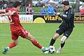 Langes Bein: Andreas Schuster (links) vom TSV Kornburg stört den Karlburger Jan Martin.