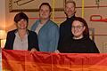 Der Vorstand des neu gegründeten Vereins 'Pride NES' mit (von links) der Vorsitzenden Peggy Pusch, Kassier Kevin Menne, Schriftführer Andreas Schmitt und der zweiten Vorsitzenden Madlen Wittmann zeigen die Regenbogenfahne.