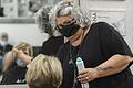 Die Corona-Krise hat in Friseursalons wie dem von Birgit Hartbauer in Würzburg die Kosten erhöht - und damit auch die Preise.
