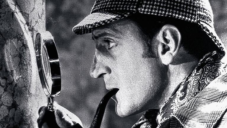 Sherlock Holmes: Der große, Pfeife rauchende, weibliche Reize konsequent ignorierende, gelegentlich zum Trübsinn neigende Asket verhielt sich im häuslichen Umgang schlampig (Szene aus „Die Abenteuer des Sherlock Holmes“, 1939, mit Basil Rathbone). Sherlock Holmes: Der große, Pfeife rauchende, weibliche Reize konsequent ignorierende, gelegentlich zum Trübsinn neigende Asket verhielt sich im häuslichen Umgang schlampig (Szene aus „Die Abenteuer des Sherlock Holmes“, 1939, mit Basil Rathbone).
