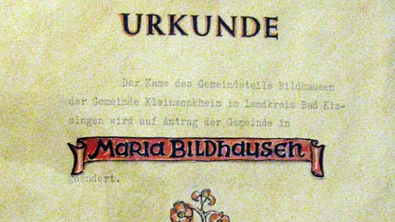 Die heute historische Urkunde mit dem Siegel des Innenministeriums, die bestätigt, dass der Kleinwenkheimer Gemeindeteil nun Maria Bildhausen heißt.       -  Die heute historische Urkunde mit dem Siegel des Innenministeriums, die bestätigt, dass der Kleinwenkheimer Gemeindeteil nun Maria Bildhausen heißt.