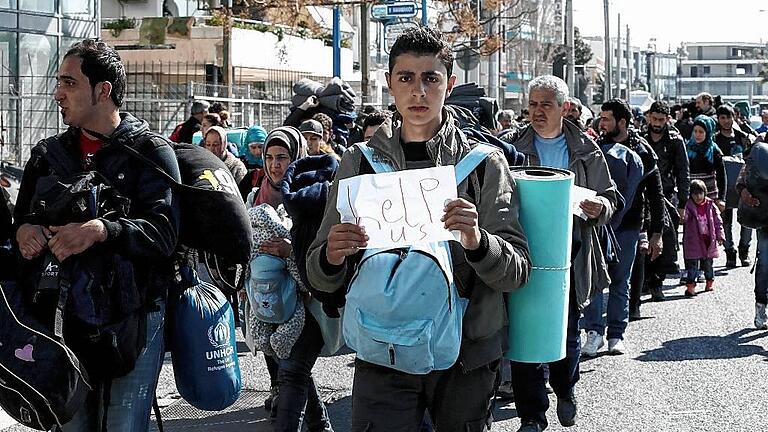 Refugees and migrants situation in Athens       -  Der Marsch der Flüchtlinge: Tausende Migranten sitzen in Griechenland fest. Es droht eine humanitäre Katastrophe.