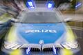 Polizei       -  Ein Streifenwagen der Polizei mit eingeschaltetem Blaulicht.