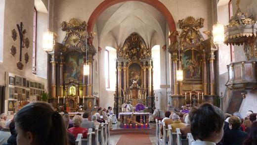 Fürbitte im Festgottesdienst: 'Beschütze die Menschen, die im neuen Pilgerheim arbeiten. Lass Wallfahrer und Wanderer Geborgenheit und Erholung finden'.