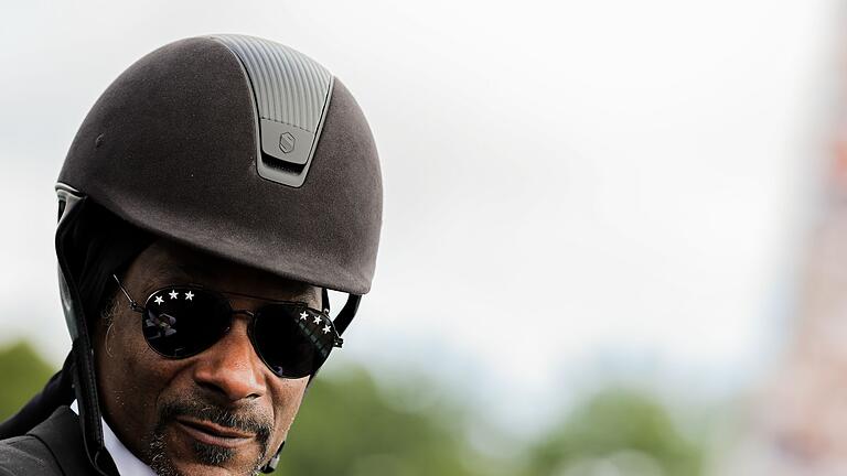 Paris 2024 - Pferdesport - War omnipräsent bei den Olympia-Wettkämpfen: US-Rapper Snoop Dogg Paris 2024 - Pferdesport - War omnipräsent bei den Olympia-Wettkämpfen: US-Rapper Snoop Dogg
