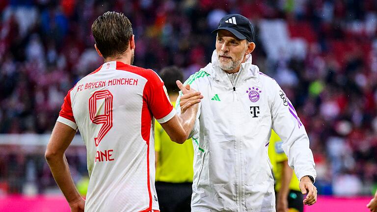 Harry Kane (links) und Thomas Tuchel (rechts)       -  Englands Kapitän Harry Kane freut sich auf seinen früheren Bayern-Coach Thomas Tuchel als künftigen Nationaltrainer.