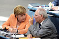 Früherer Bundestagspräsident Wolfgang Schäuble ist tot.jpeg       -  Früherer Bundestagspräsident Wolfgang Schäuble ist tot ARCHIV - 01.07.2015, Berlin: Bundeskanzlerin Angela Merkel und der damalige Bundesfinanzminister Wolfgang Schäuble (beide CDU) unterhalten sich am 01.07.2015 im Bundestag in Berlin. Der frühere Bundestagspräsident Wolfgang Schäuble ist tot. Der CDU-Politiker sei im Kreise seiner Familie zu Hause am Dienstagabend gegen 20 Uhr friedlich eingeschlafen.(zu dpa 'Früherer Bundestagspräsident Wolfgang Schäuble ist tot') Foto: Rainer Jensen/dpa +++ dpa-Bildfunk +++