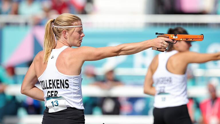 Paris 2024 - Moderner Fünfkampf - Fünfkämpferin Annika Zillekens mit der Laserpistole beim Laser Run. Paris 2024 - Moderner Fünfkampf - Fünfkämpferin Annika Zillekens mit der Laserpistole beim Laser Run.