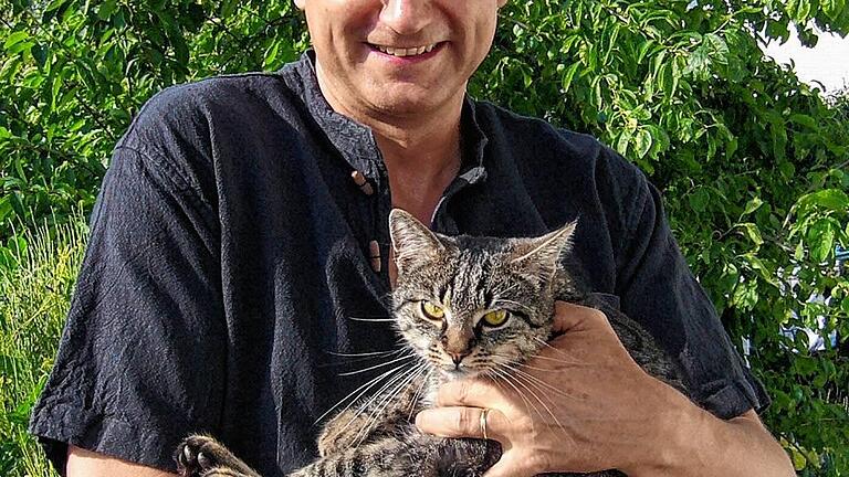 Sepp       -  Wettpartner: Sportchef Günther Schwärzer mit Kater Fidel.
