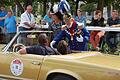 Prinzregent Luitpold (Peter Krug) in der blauen Uniform und Kaiserin Auguste Victoria (Karin Matthes, daneben) begrüßen die Fahrer beim Concour d'Elegance, dahinter die Jury. Foto: Sigismund von Dobschütz       -  Prinzregent Luitpold (Peter Krug) in der blauen Uniform und Kaiserin Auguste Victoria (Karin Matthes, daneben) begrüßen die Fahrer beim Concour d'Elegance, dahinter die Jury. Foto: Sigismund von Dobschütz