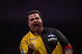 Gabriel Clemens       -  Gabriel Clemens feiert seinen Einzug ins Achtelfinale der Darts-WM.