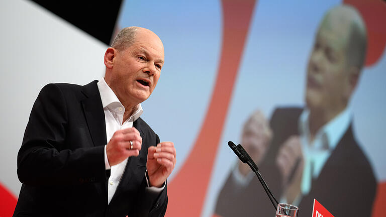 Bernd von Jutrczenka, dpa, Scholz Parteitag.jpg - Kanzler Olaf Scholz beschwört am SPD-Parteitag Geschlossenheit in den eigenen Reihen. Bernd von Jutrczenka, dpa, Scholz Parteitag.jpg - Kanzler Olaf Scholz beschwört am SPD-Parteitag Geschlossenheit in den eigenen Reihen.