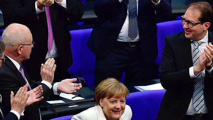 TOPSHOT-GERMANY-POLITICS-GOVERNMENT - Angela Merkel (CDU) am Mittwoch in Berlin nach der Wahl zur Bundeskanzlerin. TOPSHOT-GERMANY-POLITICS-GOVERNMENT - Angela Merkel (CDU) am Mittwoch in Berlin nach der Wahl zur Bundeskanzlerin.