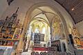 Bilderreich: Die drei Altäre der Creglinger Herrgottskirche und die Darstellung des heiligen Christopherus an einer Seitenwand der Apsis.