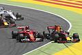 Kollision       -  Kimi Räikkönen (l) vom Team Scuderia Ferrari kollidiert mit Max Verstappen vom Team Red Bull Racing. Foto: Emilio Morenatti
