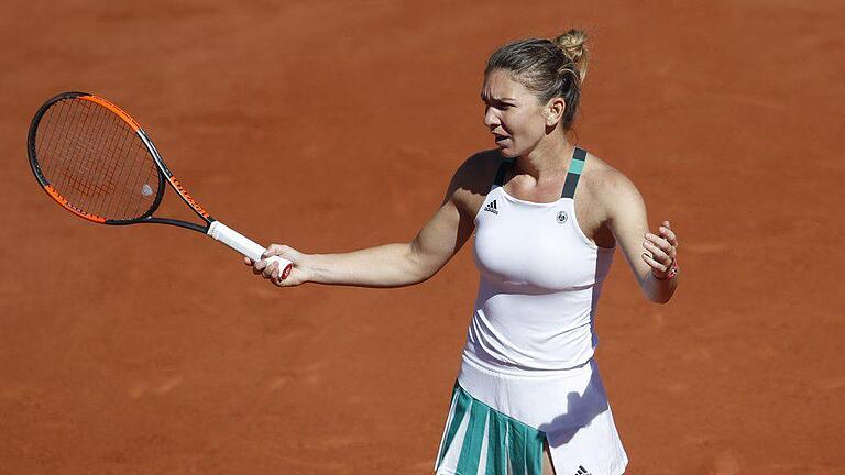 Enttäuscht       -  Simona Halep hat den Sprung auf Platz eins der Weltrangliste verpasst. Foto: Christophe Ena