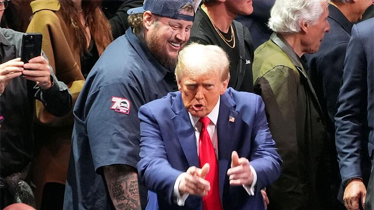 Trump bei UFC-Kampf       -  Trump und Musk bei Kampfsport-Spektakel in New York.