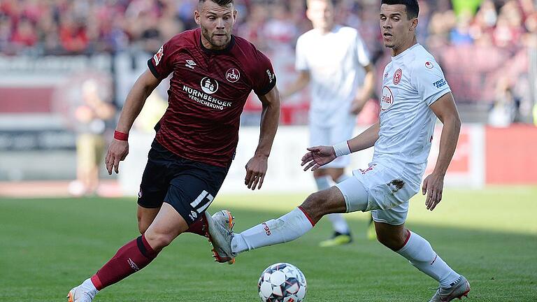 1. FC Nürnberg - Fortuna Düsseldorf       -  Gutes Startelfdebüt, aber kein Lob vom Trainer: Nürnbergs Eduard Löwen (links).