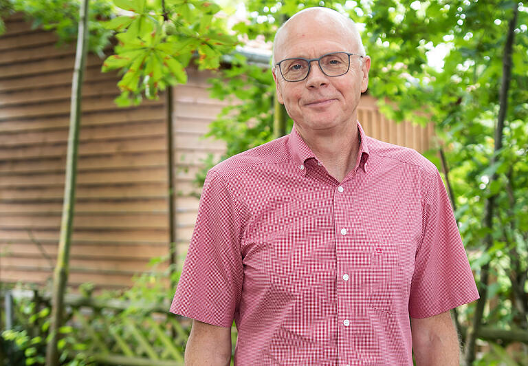 Horst Lausch, promovierter Maschinenbauer aus Gemünden, sagt: 'Für mich gibt es kein dringenderes globales Thema, das gleichzeitig eine so hohe lokale Bedeutung hat. Die ganze Welt ist betroffen, aber auch wir in unserem eigenen Umfeld.'