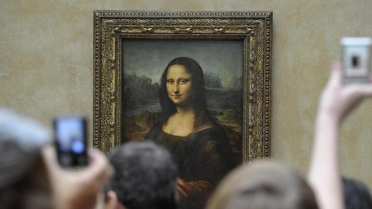 Das berühmteste Gemälde der Welt: Leonardos «Mona Lisa» im Pariser Louvre. Foto: Horacio Villalobos/EPA       -  Wissenschaftler wollen die Brücke im Hintergrund der 'Mona Lisa' verortet haben.