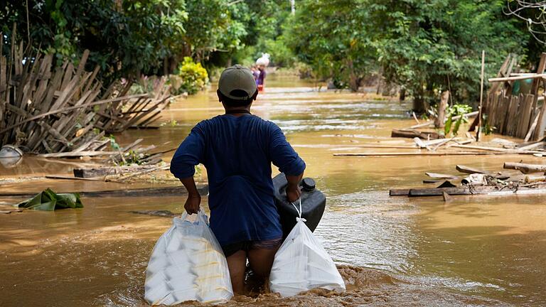 Überschwemmung in Myanmar       -  Auch die Menschen in Myanmar kämpfen mit Überflutungen.