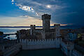 gardasee unwetter.jpeg       -  Dunkle Wolken über Sirmione - am Gardasee kann es hin und wieder zu einem Unwetter kommen.