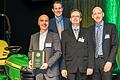 Michael Jendis hält die begehrte Auszeichnung in den Händen, (von links) Michael Jendis Executive Director Commercial Vehicles, Preh),Richard Czarnecki (Vice President Global Supply Management Agricultural &amp; Turf, John Deere),Roland Schlechter (Quality and Customer Service Engineer, Preh) und David Meyer (Vice President Global Supply Management &amp; Logistic, John Deere).