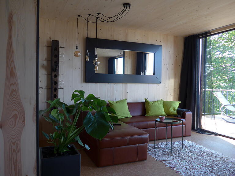 Der Wohnbereich mit einem Bett-Sofa für eine Belegung mit 4 Personen. Der Wohnbereich mit einem Bett-Sofa für eine Belegung mit 4 Personen. 