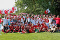 Die Aufstiegsmannschaft des SV Birkenfeld mit ihren mitgereisten Fans nach dem verdienten Erfolg im Bachstadion in Kürnach.&nbsp;