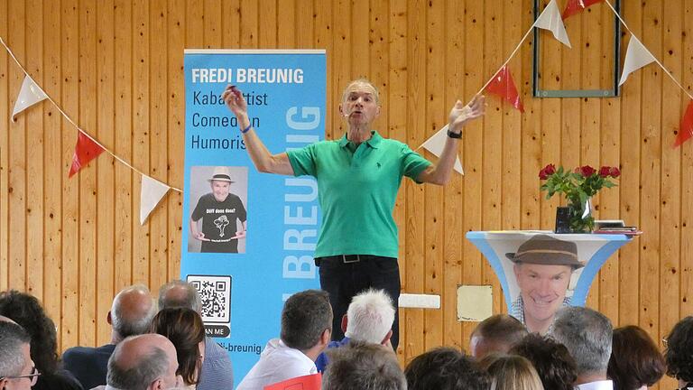 Am Feiertag, dem Tag der Deutschen Einheit, trat Fredi Breunig erneut zum Kabarett-Frühschoppen auf. Über 100 Gäste fanden den Weg nach Gauaschach ins TSV Sportheim und konnten herzhaft über sein neues Programm lachen. - Am Feiertag, dem Tag der Deutschen Einheit, trat Fredi Breunig erneut zum Kabarett-Frühschoppen auf. Über 100 Gäste fanden den Weg nach Gauaschach ins TSV Sportheim und konnten herzhaft über sein neues Programm lachen. Am Feiertag, dem Tag der Deutschen Einheit, trat Fredi Breunig erneut zum Kabarett-Frühschoppen auf. Über 100 Gäste fanden den Weg nach Gauaschach ins TSV Sportheim und konnten herzhaft über sein neues Programm lachen. - Am Feiertag, dem Tag der Deutschen Einheit, trat Fredi Breunig erneut zum Kabarett-Frühschoppen auf. Über 100 Gäste fanden den Weg nach Gauaschach ins TSV Sportheim und konnten herzhaft über sein neues Programm lachen.