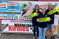 Die Wöllbicher Kirmes lockt nach Wollbach, Burkardroth. Mit dabei ist Ex-Dschungelkönigin Melanie Müller. Auf dem Foto (von links) Birgit Below, Elvira Huppmann und Matthias Wehner.   Foto: Anja Vorndran       -  Die Wöllbicher Kirmes lockt nach Wollbach, Burkardroth. Mit dabei ist Ex-Dschungelkönigin Melanie Müller. Auf dem Foto (von links) Birgit Below, Elvira Huppmann und Matthias Wehner.   Foto: Anja Vorndran