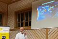 Im Bild: Dr. Thomas Müller bei seinem Vortrag über Asteroidenforschung.