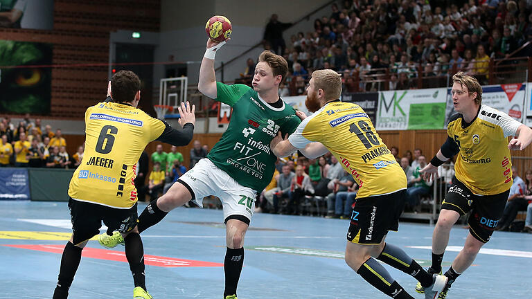 DKB 2. Handball-Bundesliga, DJK Rimpar Wölfe - HSC 2000 Coburg       -  v.li.: Maximilian Jaeger (HSC 2000 Coburg), Lukas Siegler (DJK Rimpar Wölfe), Anton Prakapenia (HSC 2000 Coburg), Markus Hagelin (HSC 2000 Coburg)