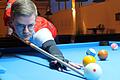 Der 23 Jahre alte Chemie-Doktorant Lukas Lubczky spielt seit 2018 beim 1. Pool-Billard-Club (PBC) Würzburg/Kitzingen. Bei den Landesmeisterschaften, die Ende Januar in Würzburg stattfanden, verpasste Lubczky in zwei Disziplinen knapp das Viertelfinale.