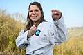 Vanessa Nüßlein im Taekwondo-Anzug auf einer Wiese in Theilheim Die 24-Jährige&nbsp; hat den schwarzen Gürtel.