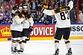 Sieg!       -  Die deutschen Eishockey-Nationalspieler Felix Schütz (l-r), Dennis Seidenberg und Philip Gogulla jubeln. Foto: Marius Becker