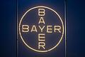 Bayer       -  Das Bayer-Kreuz, das Logo des Unternehmens, leuchtet auf dem Werksgelände von Bayer in Leverkusen.