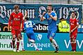 Fussball, 2. Bundesliga, VfL Bochum - FC Würzburger Kickers       -  Freud und Leid: Während die Würzburger Sebastian Ernst (links) und Emanuel Taffertshofer (rechts) bedröppelt dreinblicken, jubeln der Bochumer Torschütze zum 1:0, Tom Weilandt (Nummer 23), und Pawel Dawidowicz.