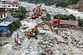 Schlammlawine in China       -  Rettungskräfte suchen nach Sturzfluten und Schlammlawinen  im Dorf Ridi in der Stadt Kangding nach Überlebenden (Foto aktuell).