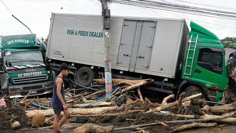Nach dem Tropensturm Trami auf den Philippinen - Der Tropensturm Trami hat Erdrutsche ausgelöst. Nach dem Tropensturm Trami auf den Philippinen - Der Tropensturm Trami hat Erdrutsche ausgelöst.