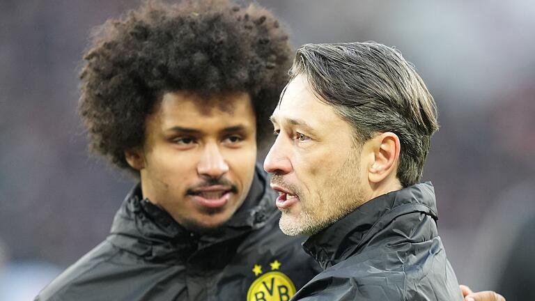 FC St. Pauli - Borussia Dortmund       -  Karim Adeyemi (l) profitiert vom neuen Dortmunder Trainer Niko Kovac.