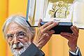 Hoch die Palme! Michael Haneke mit der Siegestrophäe.