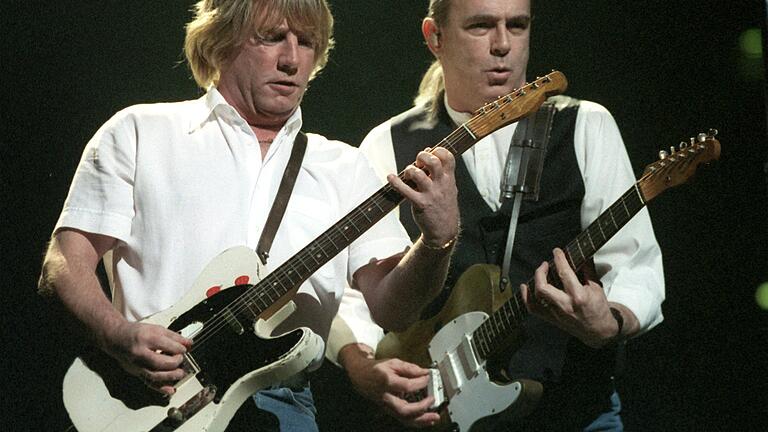 'Es gab Reibungen': Rossi (rechts) mit dem Ende 2016 gestorbenen Gitarristen Rick Parfitt im Jahr 1999. 'Es gab Reibungen': Rossi (rechts) mit dem Ende 2016 gestorbenen Gitarristen Rick Parfitt im Jahr 1999. 