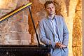 Alexander Rüth im kleinen Probensaal der Würzburger Dommusik. Seit einem Jahr ist er verantwortlich für alle musikalischen Themen der Kathedralkirche.