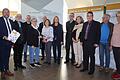 Zur Eröffnung der Wanderausstellung 'Die Retter von Baldersheim' im Landratsamt Würzburg konnte Landrat Thomas Eberth zahlreiche Gäste begrüßen (von links): Frank Stößel (Geschichtswerkstatt Aub), Klaus Saliger (stellvertretender Bürgermeister von Aub), Gisela Klemm (Nichte von Alfred Eck), Johannes Wolf (Kulturbeauftragter Aub), Kerstin Celina (Landtagsabgeordnete), Karen Heußner (stellvertretende Landrätin), Hans-Rainer Eck (Neffe von Alfred Eck), Schulamtsdirektorin Claudia Vollmar, Roman Menth (Bürgermeister von Aub), Kreisheimatpfleger Hermann Oberhofer sowie Kreisrätin Lioba Kinzinger aus Burgerroth.