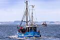 Fischkutter auf der Ostsee       -  Fischkutter fahren vom Meeresarm Peenestrom auf die Ostsee.